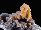 Mineral specimen: Wulfenite with Quartz coating from Finch Mine, Hayden, Arizona.