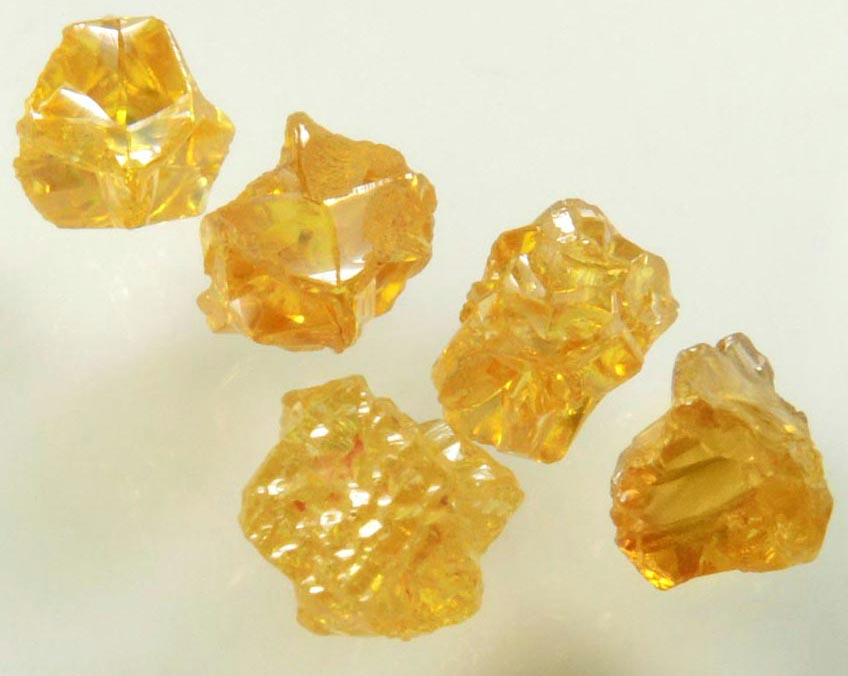 Diamond (five uncut fancy-yellow cavernous uncut rough diamonds totaling 2.93 carats) from Mbuji-Mayi, 300 km east of Tshikapa, Democratic Republic of the Congo